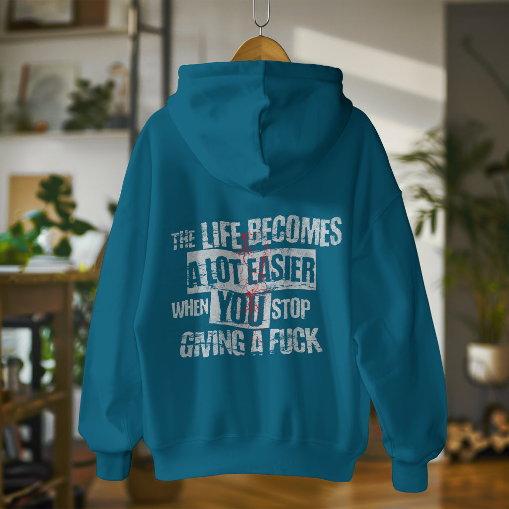 Oversized streetwear hoodie with bold phrase - The Life Becomes a Lot Easier When You Stop Giving a F**k - by Worn & Wicked Co.