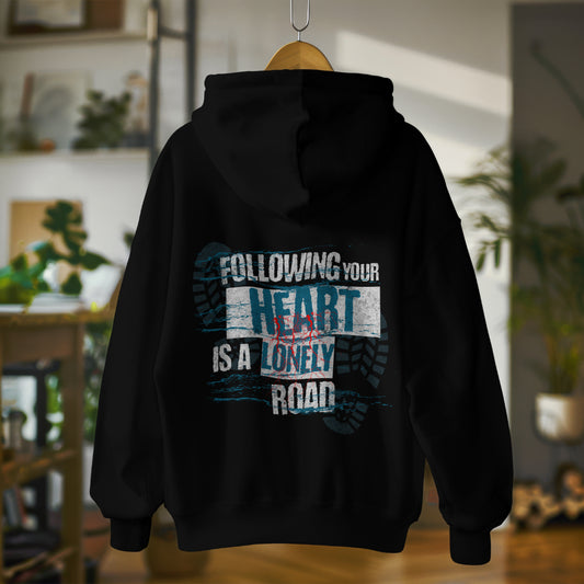 Oversized organic cotton hoodie with bold phrase - Following Your Heart Is a Lonely Road - by Worn & Wicked Co.