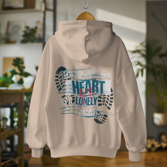 Oversized organic cotton hoodie with bold phrase - Following Your Heart Is a Lonely Road - by Worn & Wicked Co.