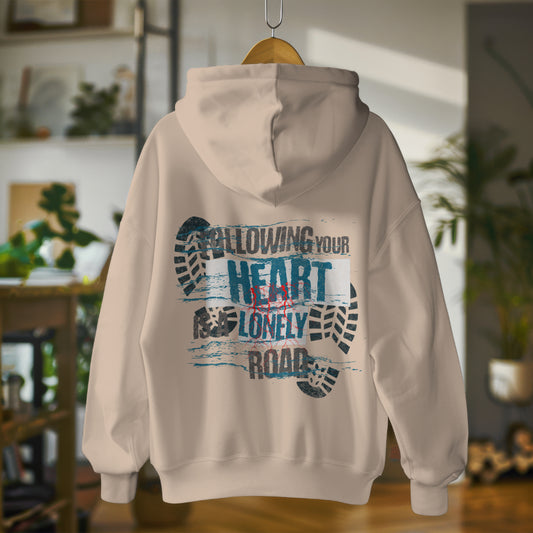 Oversized organic cotton hoodie with bold phrase - Following Your Heart Is a Lonely Road - by Worn & Wicked Co.